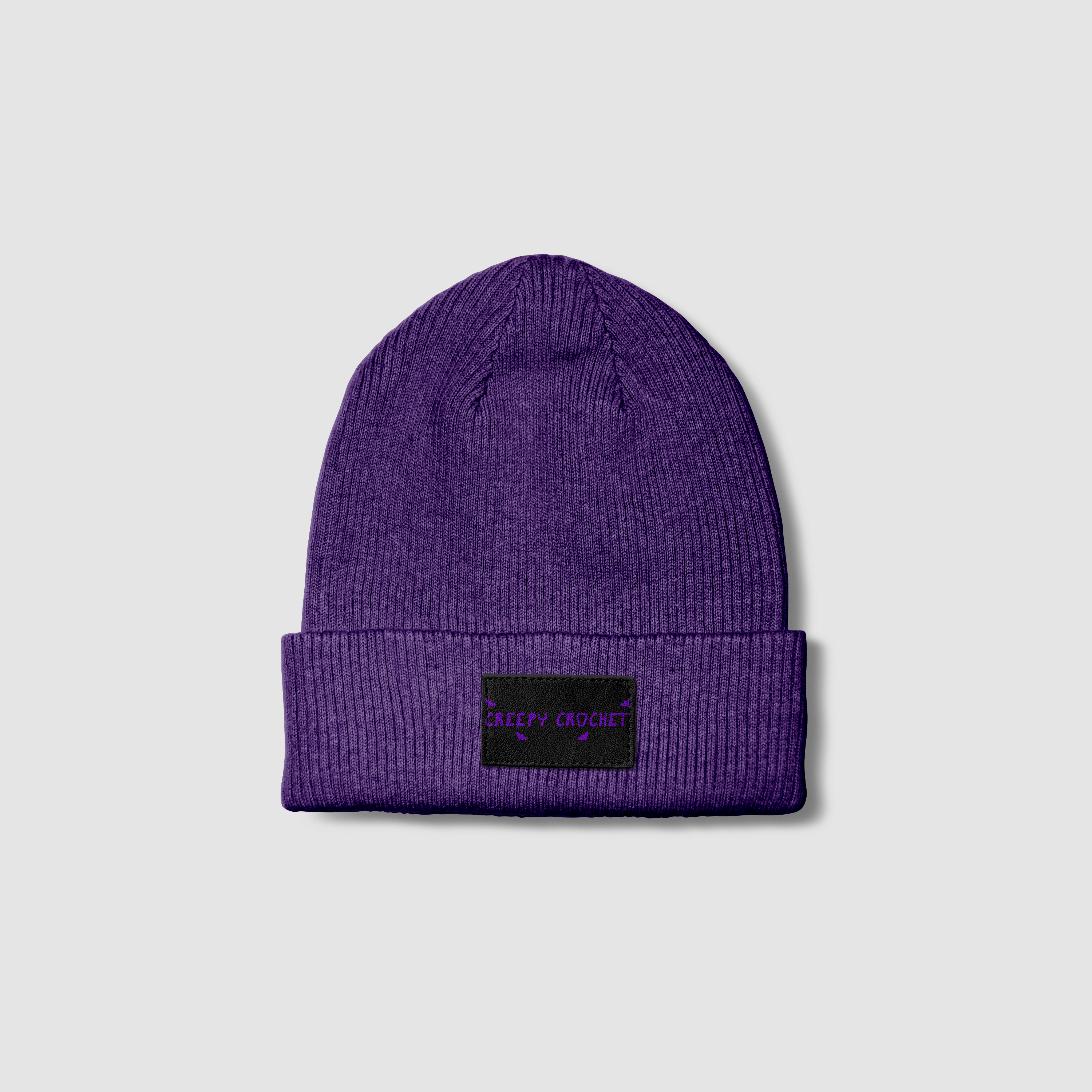 mockup of creepy crochet logo on beanie